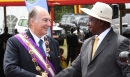 His Excellency Yoweri Museveni, President of Uganda, presentsH.H. the Aga Khan with the Most Excellent Order of the Pearl of Afr